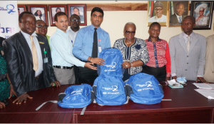  Hyundai Motors Nigeria team with staff and management of Dairy Farm Secondary School Agege Lagos at the presentation of Hyundai branded educational supplies to the school recently