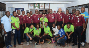 The Corps Marshal in a group photograph with the FRSC Female Handball team
