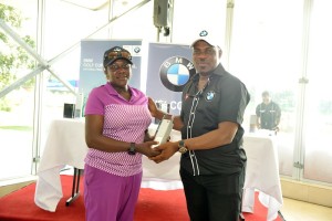 Toyin Martins, second place winner, Women Category, receiving her prize