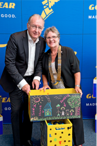 Goodyear South Africa Managing Director, Jean-Jacques Wiroth (left) hands over boxes of building blocks to Denise Pudney (right), president of Port Elizabeth Rotary Club