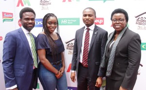  From left : Group Head, Corporate Communications of the Heritage Bank Plc, Fela Ibidapo; BB Naija 1strunner up, Bisola Ayeola; Team member, Media & External Relation Officer, Blaise Udunze and Team member, Brand Compliance & Management, Ozena Utulu, during the Big Brother Naija Season-2 reality TV show grand prize presentation in Lagos...Tuesday