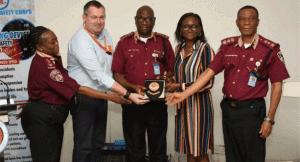 Corps Marshal, FRSC, Dr Boboye Oyeyemi (middle), presenting a plaque to the Fellowship Officer, Dutch Embassy in Nigeria, Femitayo Adebiyi (second to the right), after flagging-off the training for FRSC staff on traffic safety for Non-motorised Transport (NMT) in Abuja…Monday 