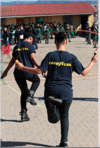 Goodyear associates, Sandisiwe Zenzwa and Jaconia Carelsen, practicing their skipping as the learners  approach